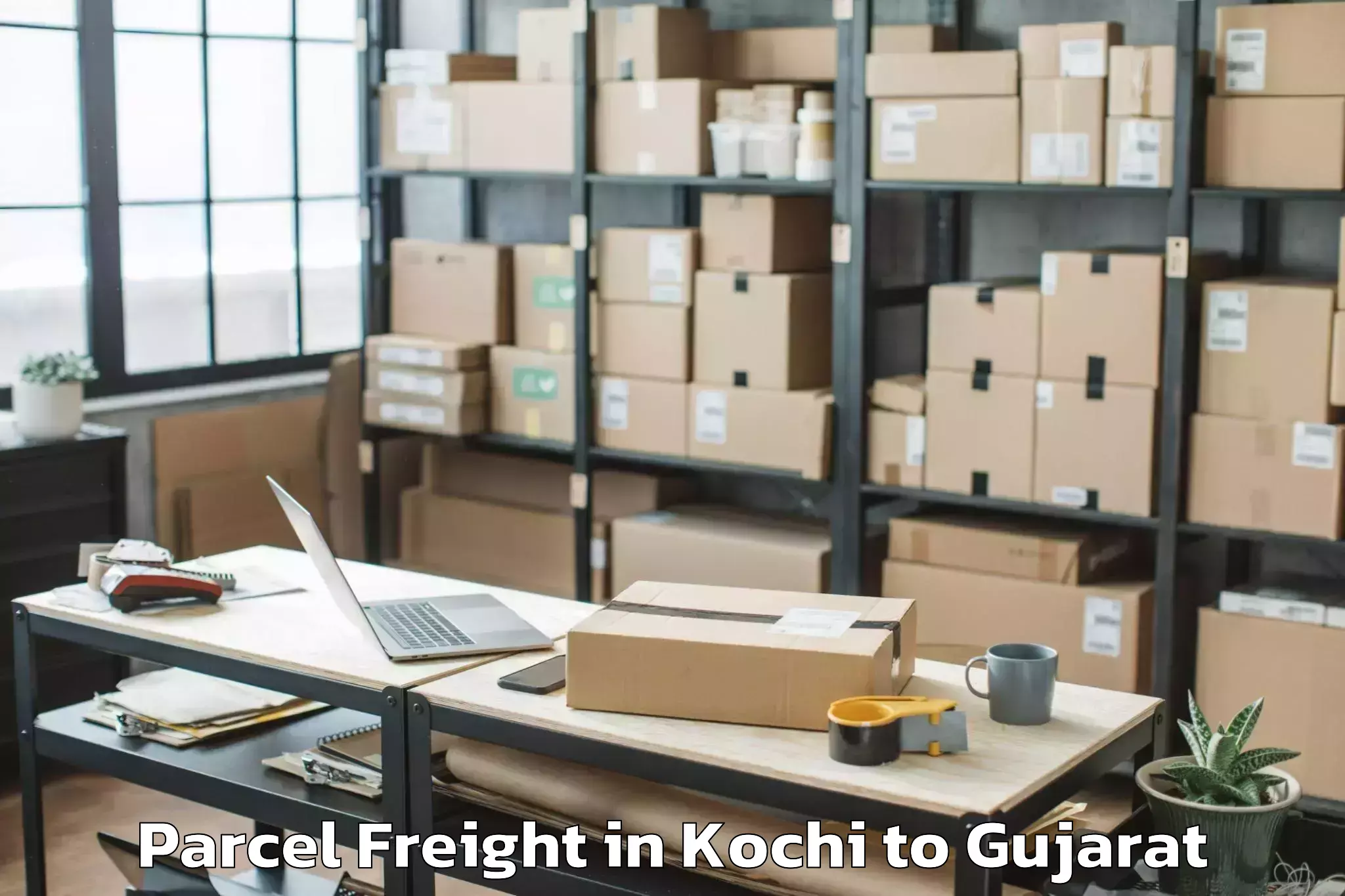 Kochi to Balasinor Parcel Freight Booking